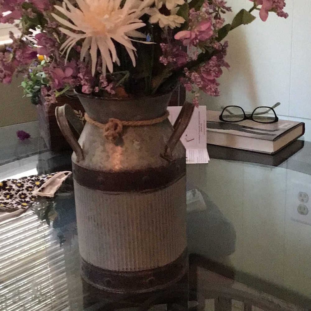 10” Metal tin filled with flowers